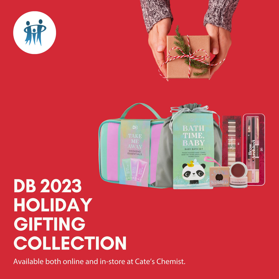 DB 2023 Holiday Gifting Collection promotional graphic, featuring an array of beauty products including a 'Take Me Away' travel essentials kit, 'Bath Time, Baby' bath set, and other makeup items, all available online and in-store at Cate's Chemist.