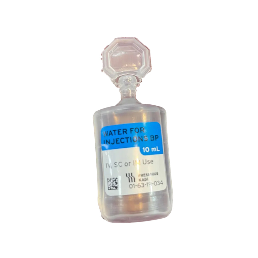 A 10 mL clear plastic vial of water for injections with a blue and white label, placed on a dark reddish-brown textured surface.