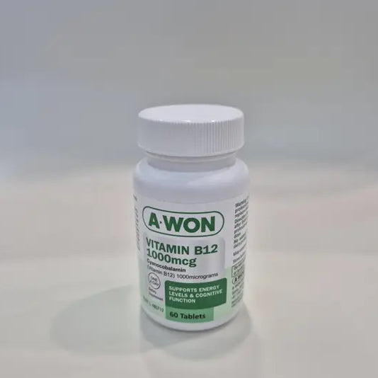 A white plastic bottle of A-Won Vitamin B12 1000mcg tablets, featuring a white cap and a white label with green text and accents, set against a neutral light gray background.