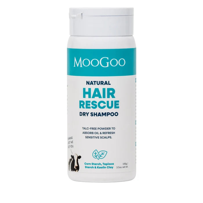 A white bottle of MooGoo Natural Hair Rescue Dry Shampoo with a teal and white label, shown on a plain white background.