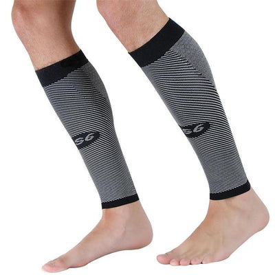 A pair of legs wearing black and grey striped compression sleeves with the logo ‘S6’ on the side.